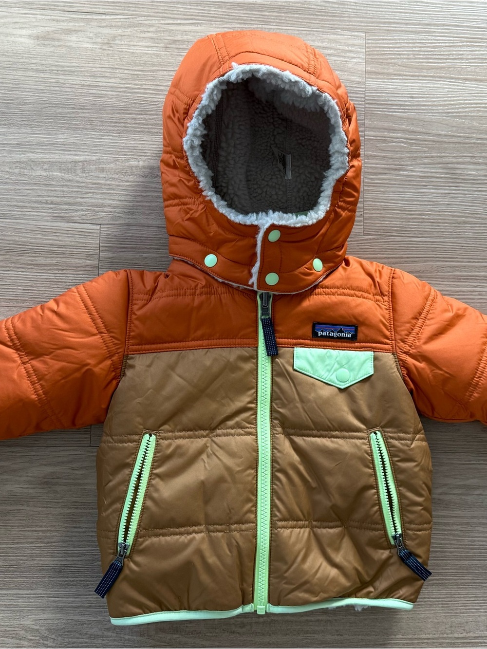 Brand newPatagonia Kids Orange & Brown Hooded Insulated Jacket 12-18 months